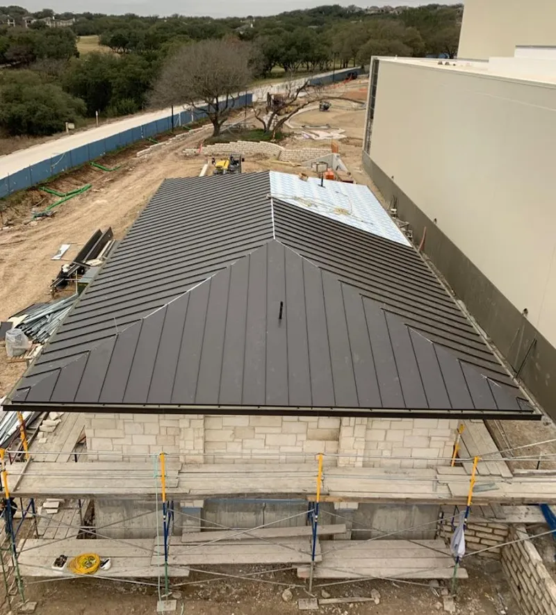 Metal roof new construction with scaffolding in Sweden